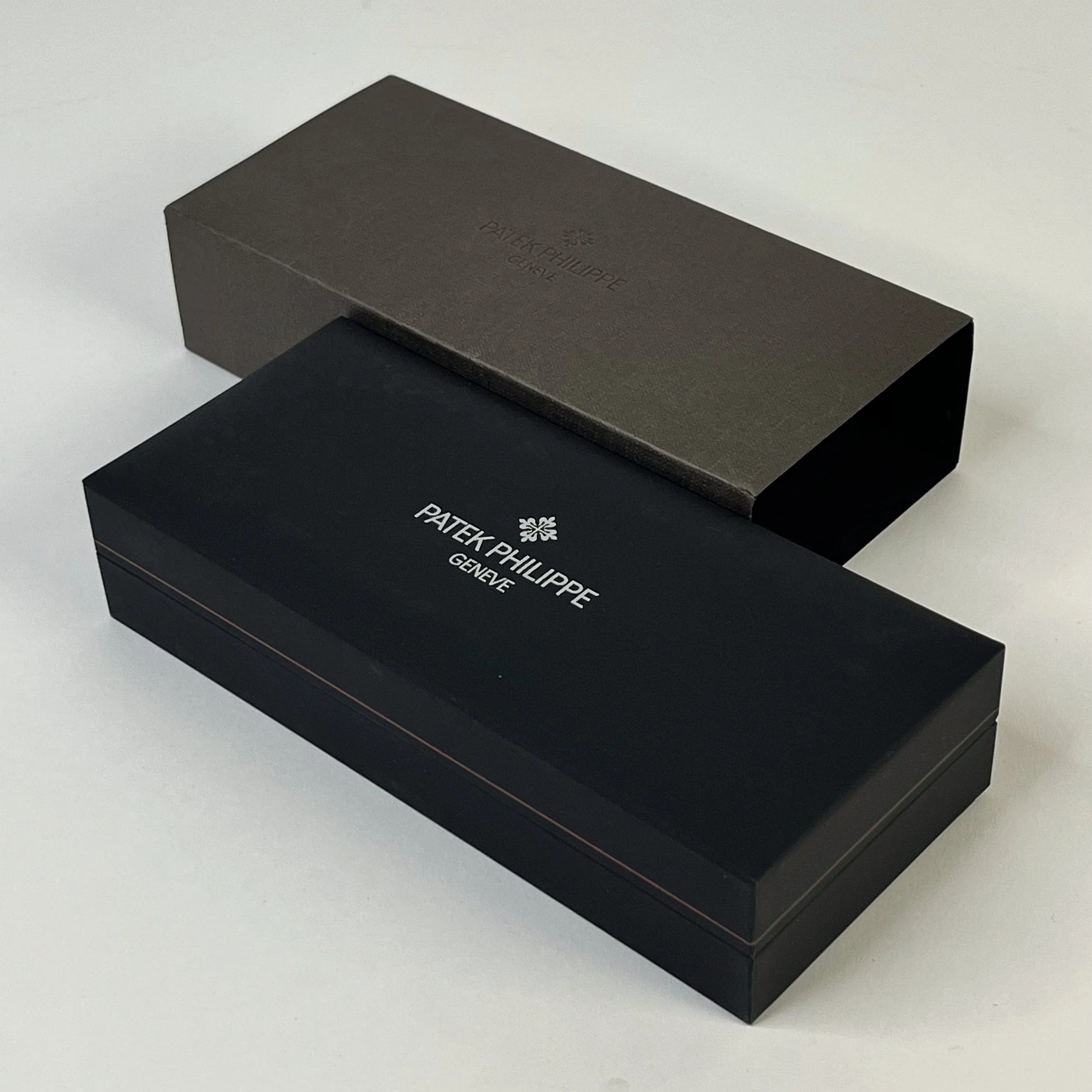 Patek Philippe Brown Leather Keychain with Embossed Logo and